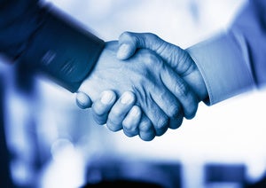 two men shaking hands trust