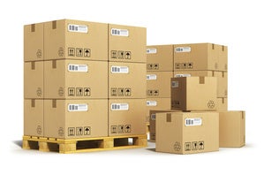 Stacks of moving boxes and parcels on pallets