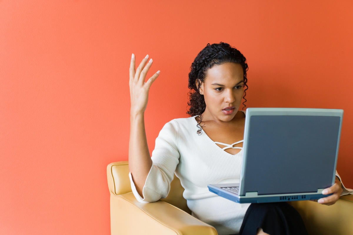 frustrated woman laptop stock